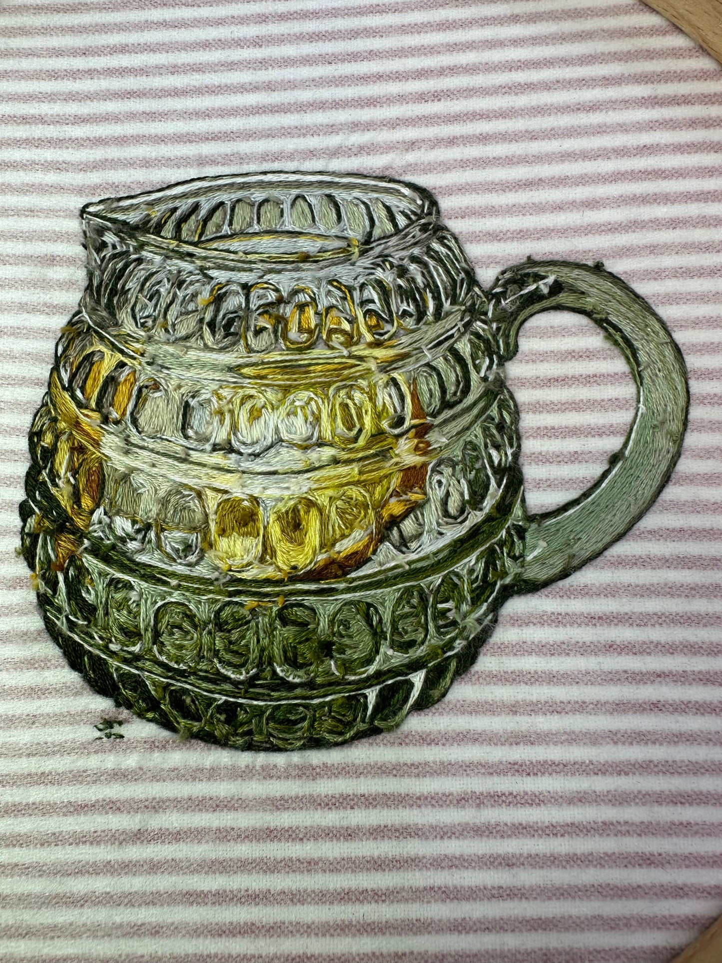 Water jug with ice & lemon